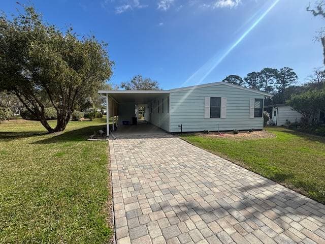 Manufactured home in Ormond Beach, FL 32174