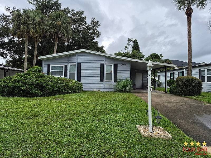 Manufactured home in Port Orange, FL 32129